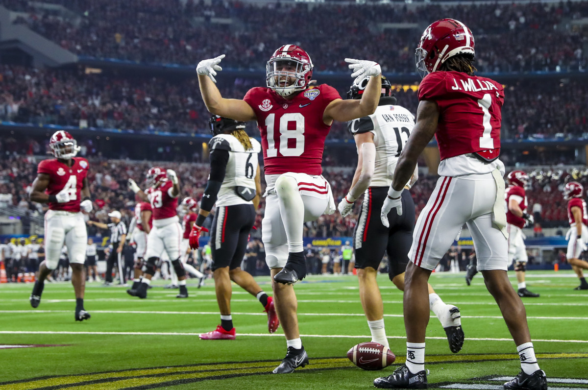 Alabama Crimson Tide wide receiver Slade Bolden (18) celebrates after scoring a touchdown against the Cincinnati Bearcats during the first quarter in the 2021 Cotton Bowl college football CFP national semifinal game at AT&T Stadium